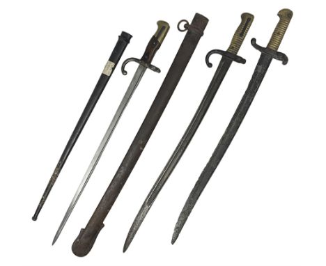 French Model 1874 Epee bayonet marked Oulle 1876 in associated scabbard; Model 1866 sabre bayonet in cut-down sword scabbard;