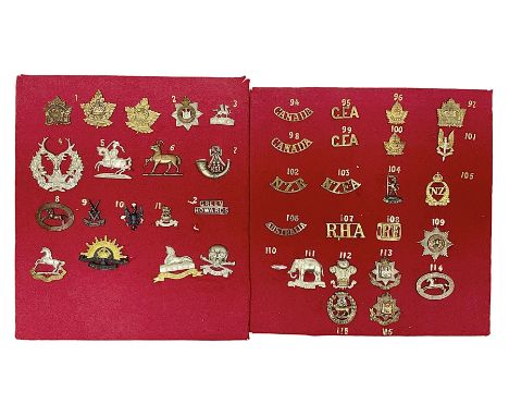 Forty glengarry and cap badges and shoulder titles including Gordon Highlanders, Canada and Canadian Field Artillery, New Zea