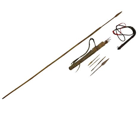 Twelve African pygmy arrows with barbed or plain iron heads and cane shafts, longest L65cm; in a vellum, leather and reptile 