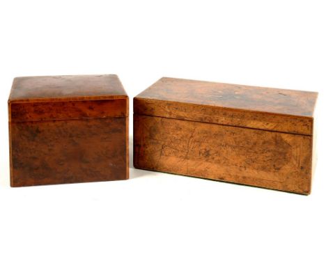 A YEW WOOD AND LINE INLAID TEA CADDY AND COVER, 15CM L AND A VICTORIAN WALNUT AND GEOMETRIC INLAID TEA CADDY, THE DIVIDED INT