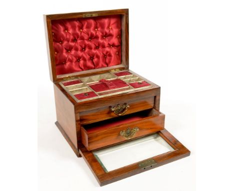 A VICTORIAN WALNUT JEWEL BOX WITH FITTED INTERIOR AND BEVELLED GLASS LIGHT TO THE FALL FRONT, 25CM L
