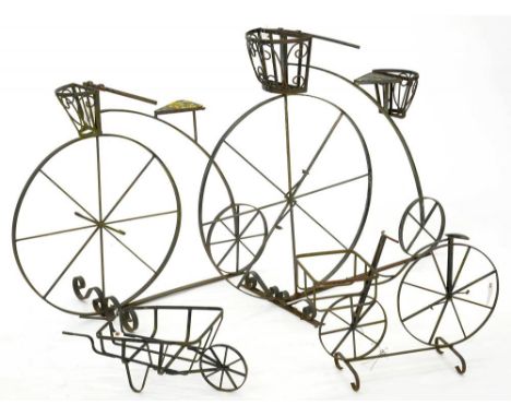 TWO WROUGHT IRON MODELS OF PENNY FARTHING BICYCLE PLANTERS AND TWO OTHERS, ONE SIMILAR, 94CM H AND A SMALLER WHEELBARROW PLAN