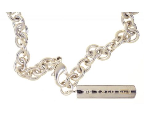 A SILVER INGOT PENDANT BY TIFFANY AND CO., ON SILVER CHAIN, MARKED 925, 45 CM, 66.5G, WITH TIFFANY BAG AND BOX++IN GOOD CONDI