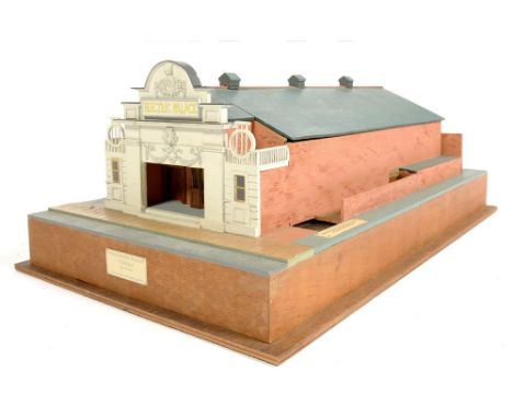 A PAINTED WOOD ARCHITECTURAL MODEL OF THE ELECTRIC PALACE CINEMA, HARWICH ON WOOD BASE, 71CM L, WITH RELATED BOOKLETS AND PRI