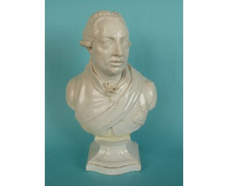 George III:  a white pottery portrait bust on integral shaped base depicted with sash and Garter Star, circa 1800, 298mm, res