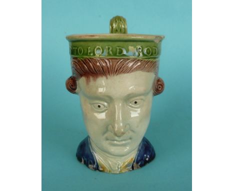 Admiral Lord Rodney: a Prattware maskhead mug inscribed around the rim and decorated in green, brown and blue, circa 1785, 10