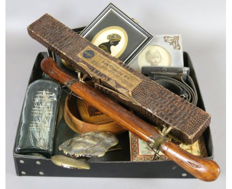 A box of collectables including ship in a bottle, silhouette miniatures and brass door knocker etc.