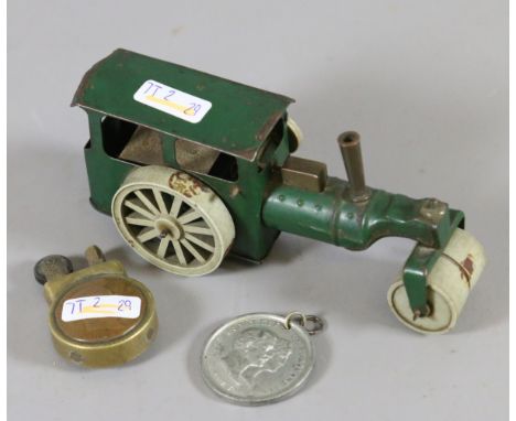 A Triang Minic traction engine along with a trench art lighter and commemorative medal.