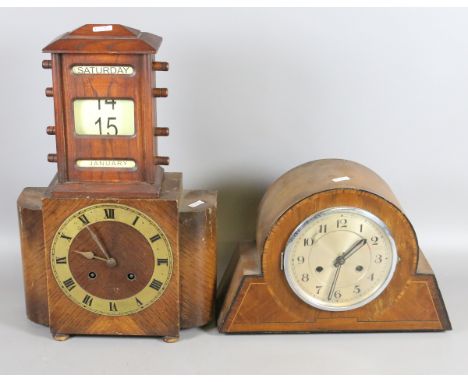 A scrolling desk calender, crossbanded walnut eight day mantel clock and an Art Deco mantel clock.