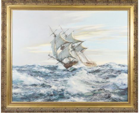 After Montague Dawson a large gilt framed marine print entitled Dawn Chase.