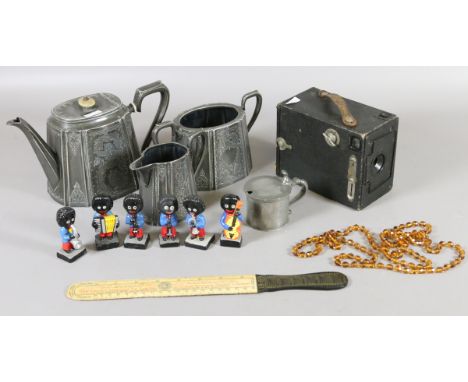 A lot of collectables to include a boxed camera, a Victorian advertising page turner, pewter tea service and mustard pot, set