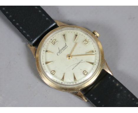 A gentleman's manual vintage 9ct gold Accurist wristwatch with convex satin dial having arrow and Arabic numeral markers.