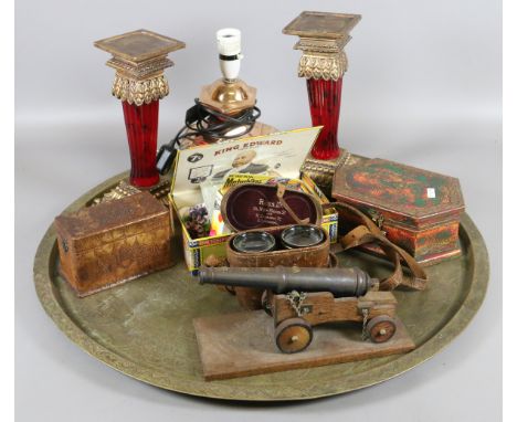 A large antique Indian enamel brass tray and assorted collectables including a model cannon, cased field binoculars, copper a