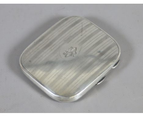 A silver cigarette case with bands of engine turned engraving, assayed Birmingham 1924, 94 grams.