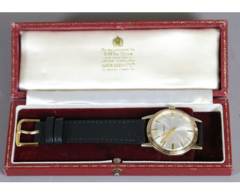 A gentleman's 9ct gold manual wristwatch in original real leather Royal Warrant box with silver dial having baton markers, sw