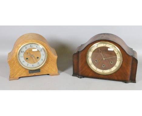 A Smiths walnut cased eight day Westminster mantel clock along with another oak cased eight day mantel clock.