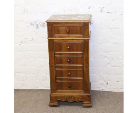 A continental walnut marble top side cabinet with single drawer and dummy drawer fronted cupboard, raised on bracket feet.