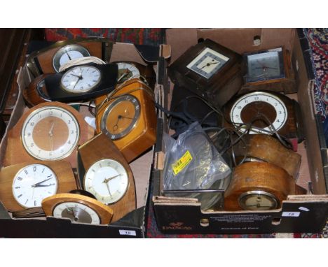 Two boxes of assorted electric mantel clocks c1950 including Smiths and clock glasses etc.