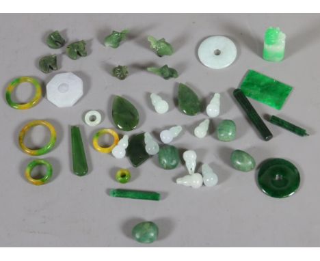 A small box of assorted Chinese jade trinkets.