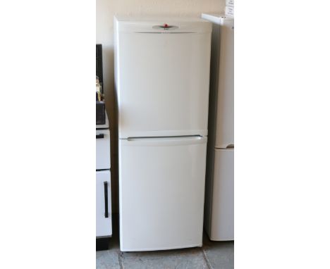 A Hoover A Class white enamel fridge freezer.