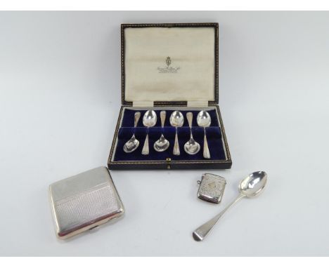 A set of six George V silver tea spoons, Sheffield 1925, boxed, curvilinear cigarette case with engine turned decoration, Lon