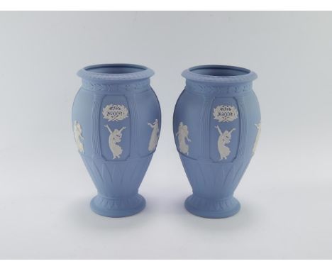 A pair of Wedgwood light blue Millennium vases, of baluster form, 20cm high.