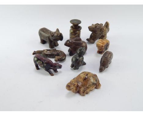 Chinese jade and other hard stone carvings, including a rhinoceros, merman, rabbit and dragons, (10).