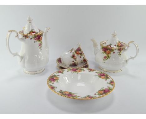 A Royal Albert porcelain part dinner tea and coffee service, decorated in the Old Country Roses pattern, comprising meat plat