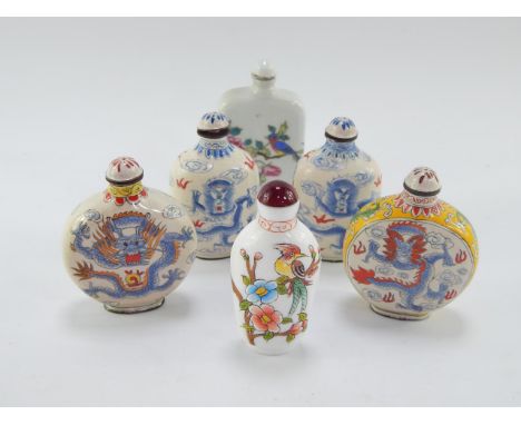 Four Chinese enamel snuff bottles, decorated with dragons, famille rose porcelain snuff bottle decorated with a bird and flow