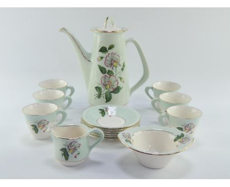 A Figgjo Flint porcelain part coffee service decorated with flowers, printed mark, comprising coffee pot, cream jug, sugar bo