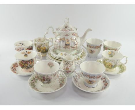 A Royal Doulton Brambly Hedge porcelain part tea service, comprising tea pot, cream jug, four salad plates, four cups, saucer