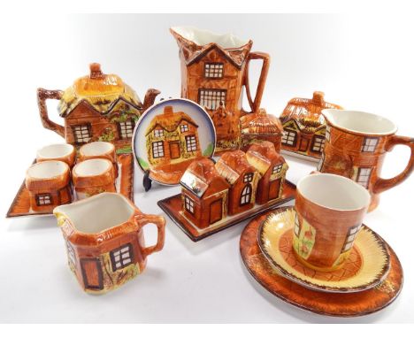 Price Kensington Cottage Ware, including a teapot, four egg cups on stand, butter dish and cover, preserve pot and a three pi