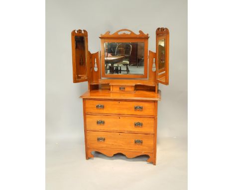 A Victorian satin walnut dressing chest, the top with a three part mirror, shaped shelf and single drawer, over three long dr