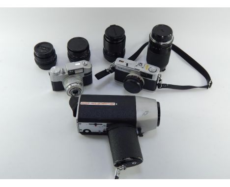 A Praktica MTLS camera with Carl Zeiss 2.8/50 lens, Bencini Comet camera, Polaroid and video cameras and accessories.