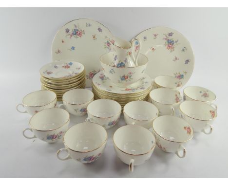 A Hammersley early 20thC porcelain tea service, printed with floral sprays, comprising cream jug, sugar bowl, pair of bread p