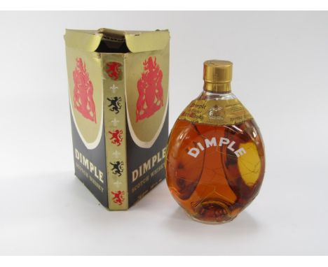 A bottle of Dimple Scotch Whisky, with original bottle.