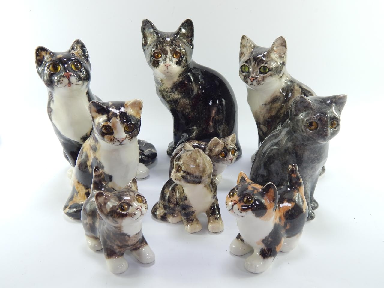 Winstanley pottery cats and kittens, with glass eyes, standing or ...