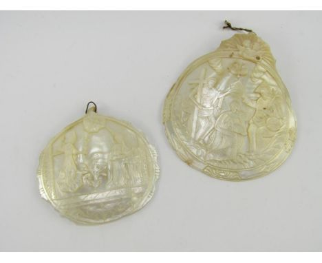 Two late 19thC Holy Land carved mother of pearl shells, one with the Annunciation, the other the Crowning of the Blessed Moth