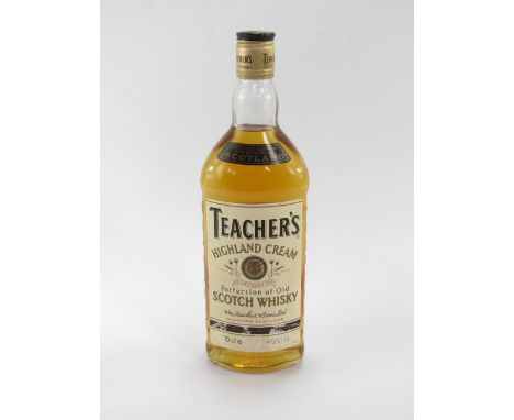 A bottle of Teachers Highland Cream Scotch Whisky.