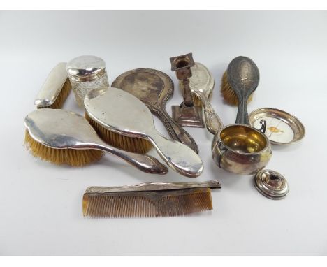 A George V cut glass toilet jar with an engraved silver lid, Birmingham 1910, four silver backed hair brushes, hand mirror, c