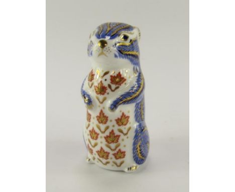 A Royal Crown Derby porcelain Imari paperweight modelled as a chipmunk, gold button.