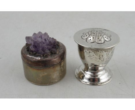 A Birmingham Guild of Handicrafts silver pepper pot, with planished decoration and pierced lid, together with a modernist sil