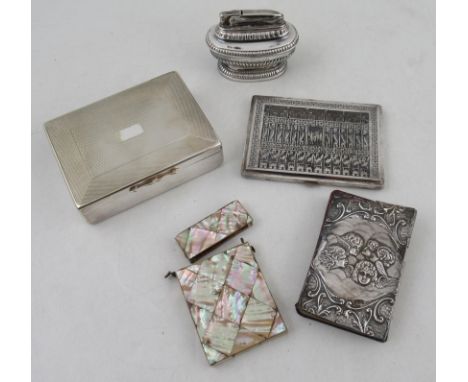 An Eastern cigarette case, together with a table lighter, a mother of pearl card case, a silver mounted prayer book and a cig