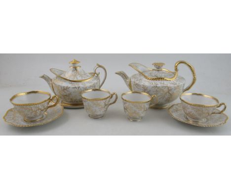 From the collection of Lord &amp; Lady Flight, A collection of seaweed decorated items, to include a teapot and stand, four c