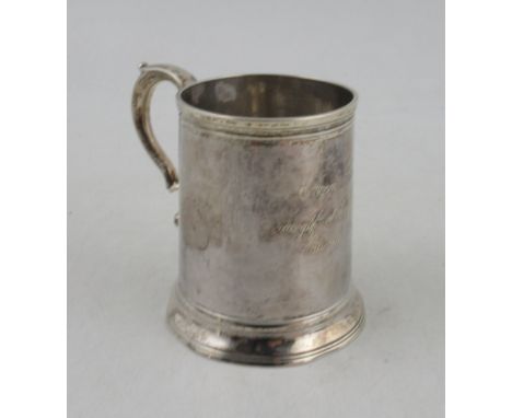 A Georgian Newcastle silver half pint mug, by John Langlands, with engraved script to the front, and scroll handle, weight 5.