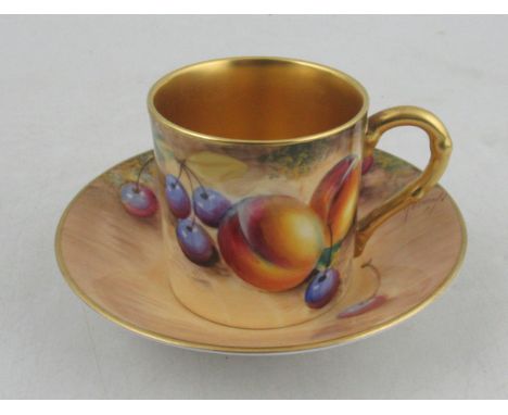 A Royal Worcester coffee can and saucer, decorated with fruit by Roberts&nbsp;