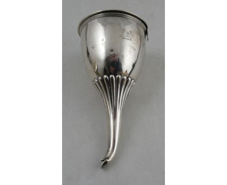 A Georgian silver two piece wine funnel, having ribbed decoration and engraved crest, weight 5oz