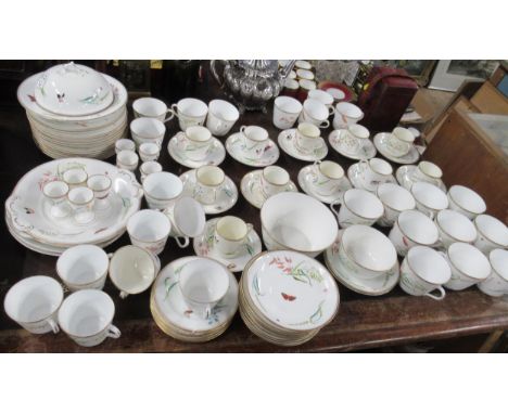 A 19th century English porcelain breakfast service, comprising, cups, saucers, plates, muffin dish, egg cups etc