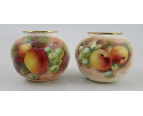 Two similar Royal Worcester vases, painted half round with fruit by Roberts and Maybury, height approx. 2.75ins&nbsp;Conditio