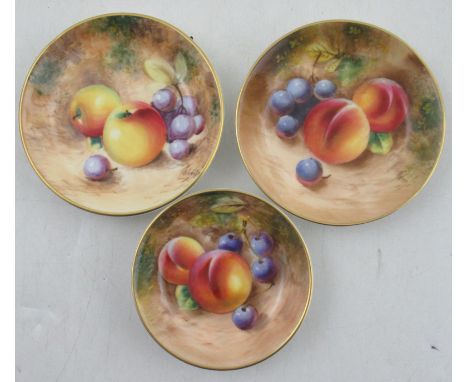 Three various Royal Worcester pin dishes, decorated with hand painted fruit by Roberts, diameter 3.75ins and down&nbsp;